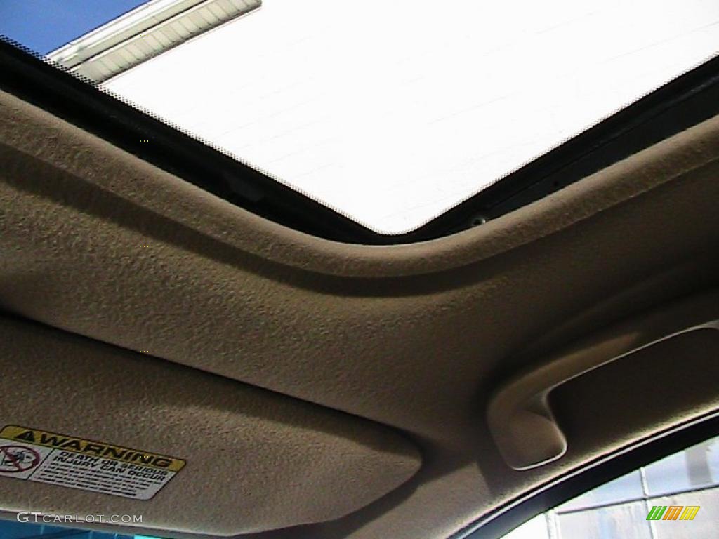 2000 Grand Cherokee Laredo 4x4 - Champagne Pearlcoat / Camel photo #54