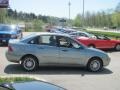 2006 Light Tundra Metallic Ford Focus ZX4 SE Sedan  photo #5