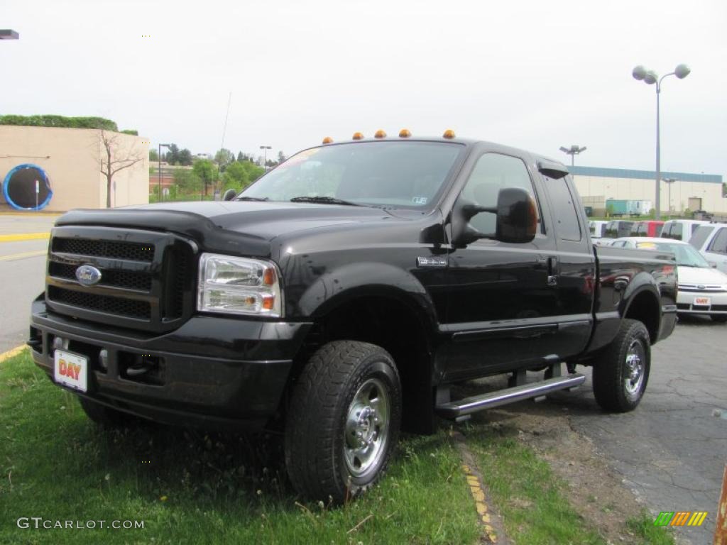 2006 F250 Super Duty FX4 SuperCab 4x4 - Black / Medium Flint photo #1