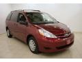 2009 Salsa Red Pearl Toyota Sienna LE  photo #1