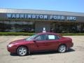 2004 Merlot Metallic Ford Taurus SE Sedan  photo #1