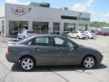 2005 Liquid Grey Metallic Ford Focus ZX4 SES Sedan  photo #3