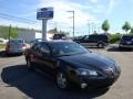 2005 Black Pontiac Grand Prix Sedan  photo #1