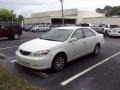 Super White - Camry LE Photo No. 1