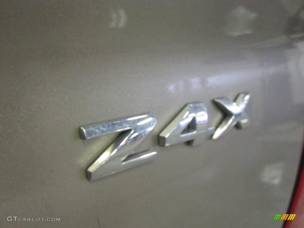 2005 Focus ZX4 SE Sedan - Arizona Beige Metallic / Dark Flint/Light Flint photo #6