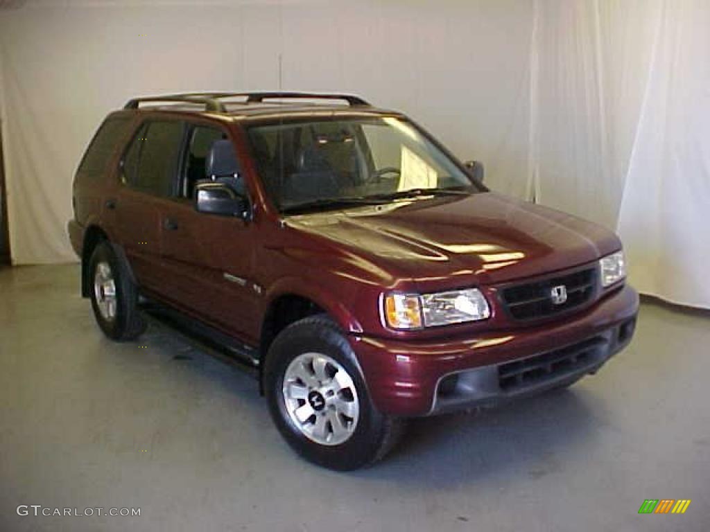 Current Red Honda Passport