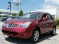 2009 Venom Red Nissan Rogue SL  photo #1