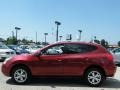 2009 Venom Red Nissan Rogue SL  photo #2