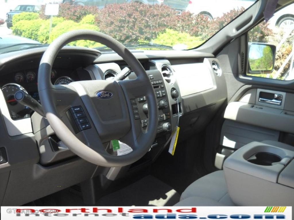2010 F150 XLT SuperCab 4x4 - Dark Blue Pearl Metallic / Medium Stone photo #10