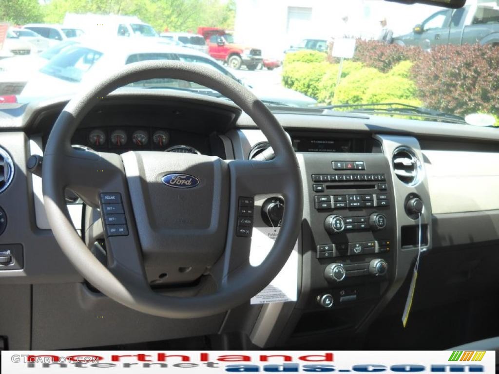 2010 F150 XLT SuperCab 4x4 - Dark Blue Pearl Metallic / Medium Stone photo #14