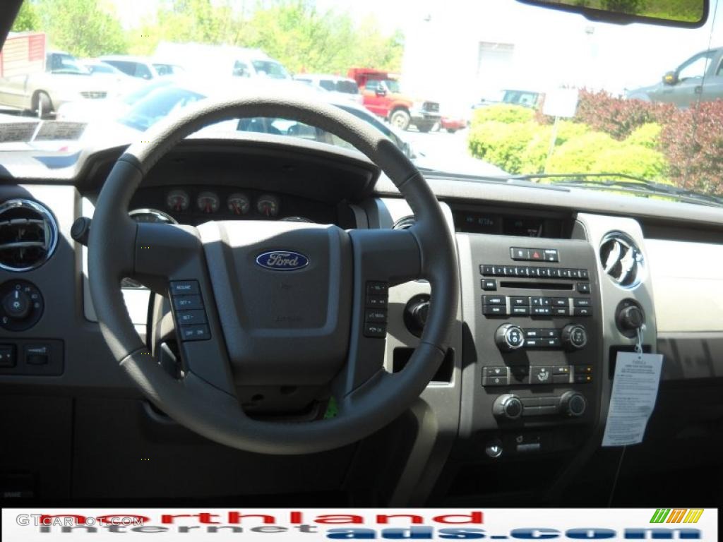 2010 F150 XLT SuperCrew 4x4 - Tuxedo Black / Medium Stone photo #14