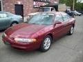 2000 Ruby Red Metallic Oldsmobile Intrigue GL #29669283