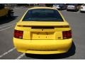 2004 Screaming Yellow Ford Mustang V6 Coupe  photo #5