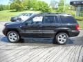 2004 Brillant Black Crystal Pearl Jeep Grand Cherokee Overland 4x4  photo #8