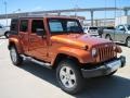 2010 Mango Tango Pearl Jeep Wrangler Unlimited Sahara 4x4  photo #2