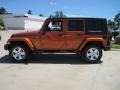 2010 Mango Tango Pearl Jeep Wrangler Unlimited Sahara 4x4  photo #3