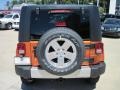 2010 Mango Tango Pearl Jeep Wrangler Unlimited Sahara 4x4  photo #6