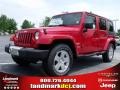 2010 Flame Red Jeep Wrangler Unlimited Sahara  photo #1