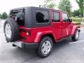 2010 Flame Red Jeep Wrangler Unlimited Sahara  photo #3