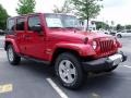 2010 Flame Red Jeep Wrangler Unlimited Sahara  photo #4