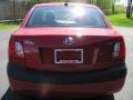 Tropical Red - Rio LX Sedan Photo No. 15