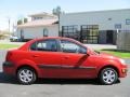 Tropical Red - Rio LX Sedan Photo No. 16
