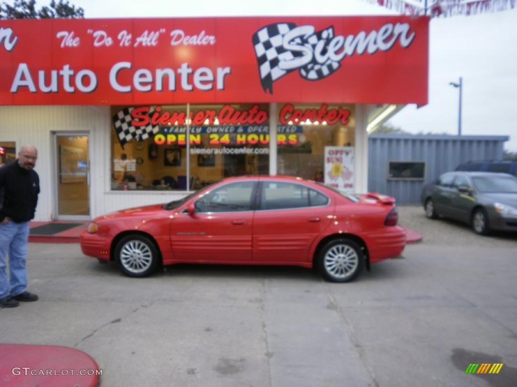 1999 Grand Am SE Sedan - Bright Red / Dark Pewter photo #1