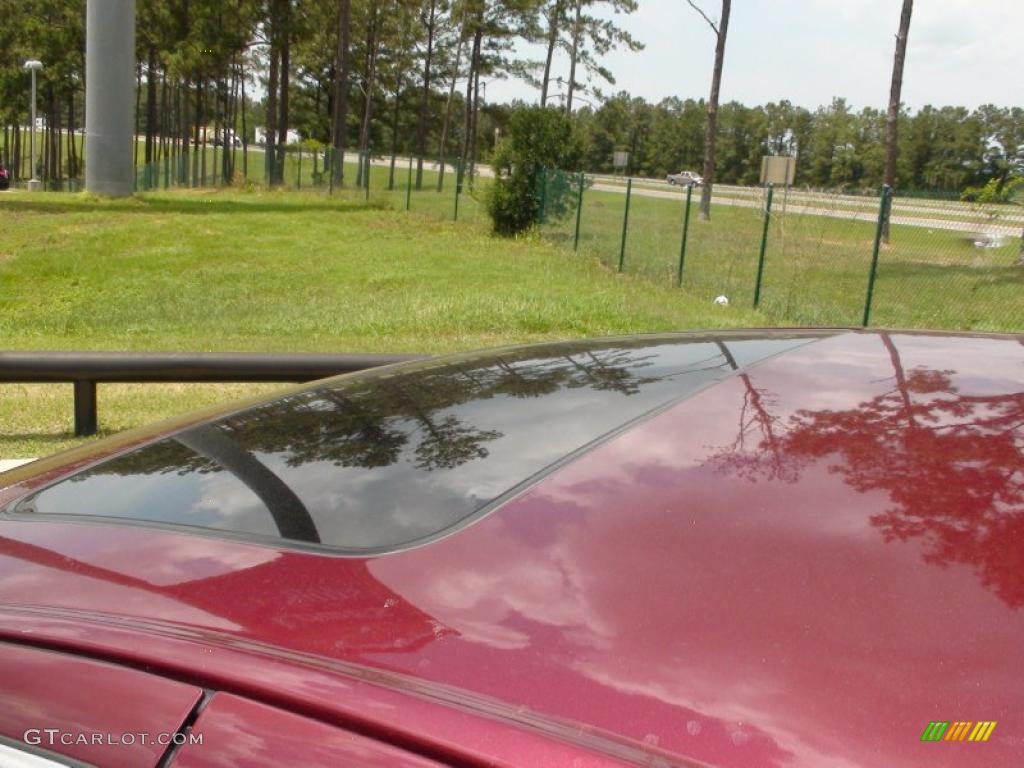 2001 LHS Sedan - Dark Garnet Red Pearl / Light Taupe photo #16