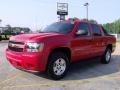 2010 Victory Red Chevrolet Avalanche LS  photo #1