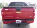 2010 Victory Red Chevrolet Avalanche LS  photo #4