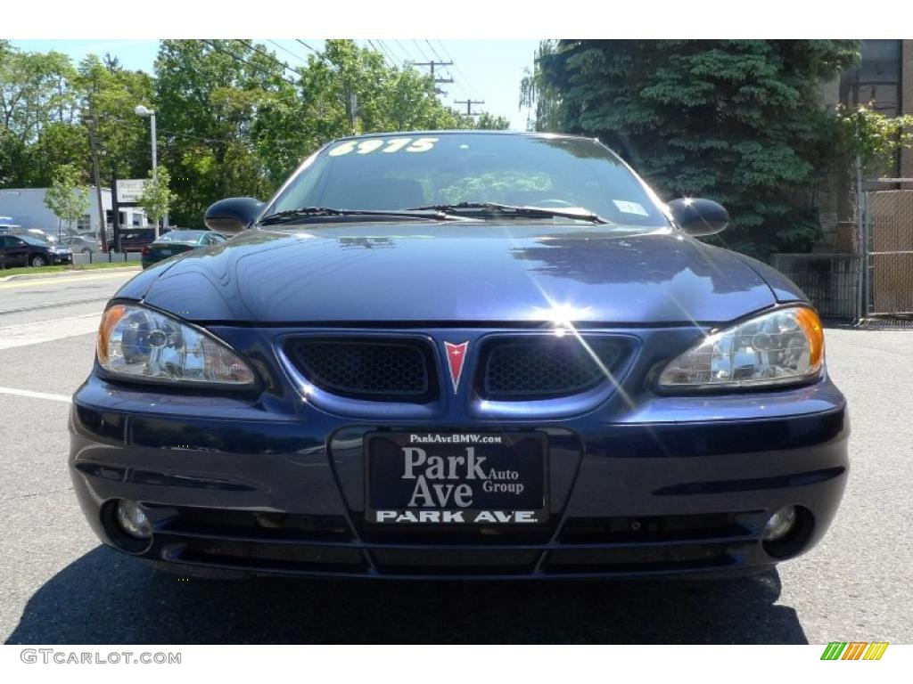 2004 Grand Am SE Sedan - Navy Blue Metallic / Dark Taupe photo #9