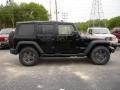 2010 Black Jeep Wrangler Unlimited Mountain Edition 4x4  photo #7