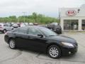 2010 Black Toyota Camry XLE  photo #1