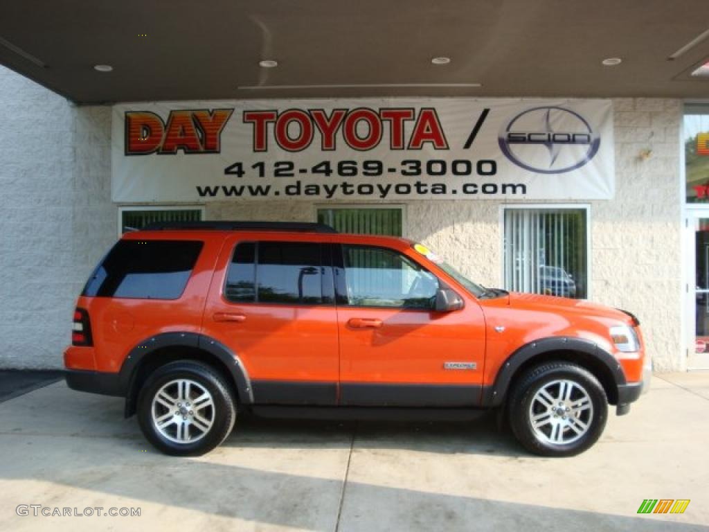 2007 Explorer XLT Ironman Edition 4x4 - Orange Frost Metallic / Black/Stone photo #1
