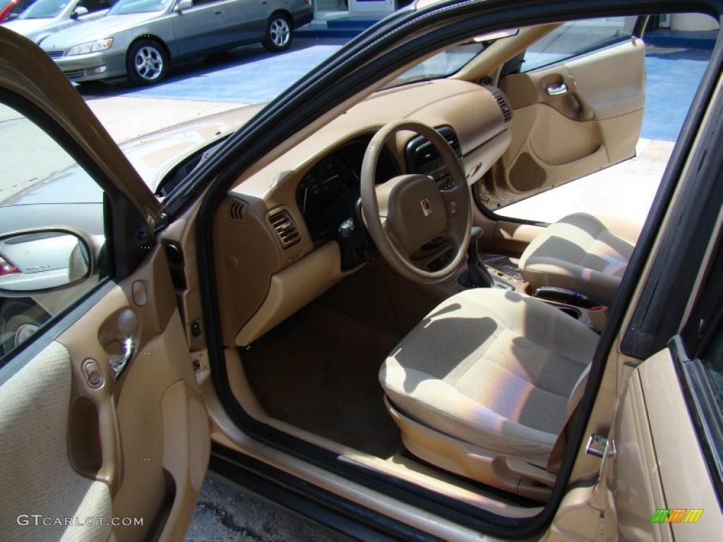 2002 L Series L100 Sedan - Medium Gold / Medium Tan photo #9