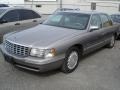 1999 Moonstone Cadillac DeVille Sedan  photo #1