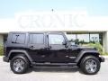 2010 Black Jeep Wrangler Unlimited Mountain Edition 4x4  photo #1