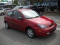2004 Sangria Red Metallic Ford Focus ZX3 Coupe  photo #1