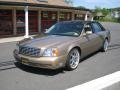Gold Firemist 1999 Cadillac DeVille Sedan