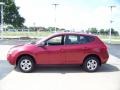 2009 Venom Red Nissan Rogue S  photo #1