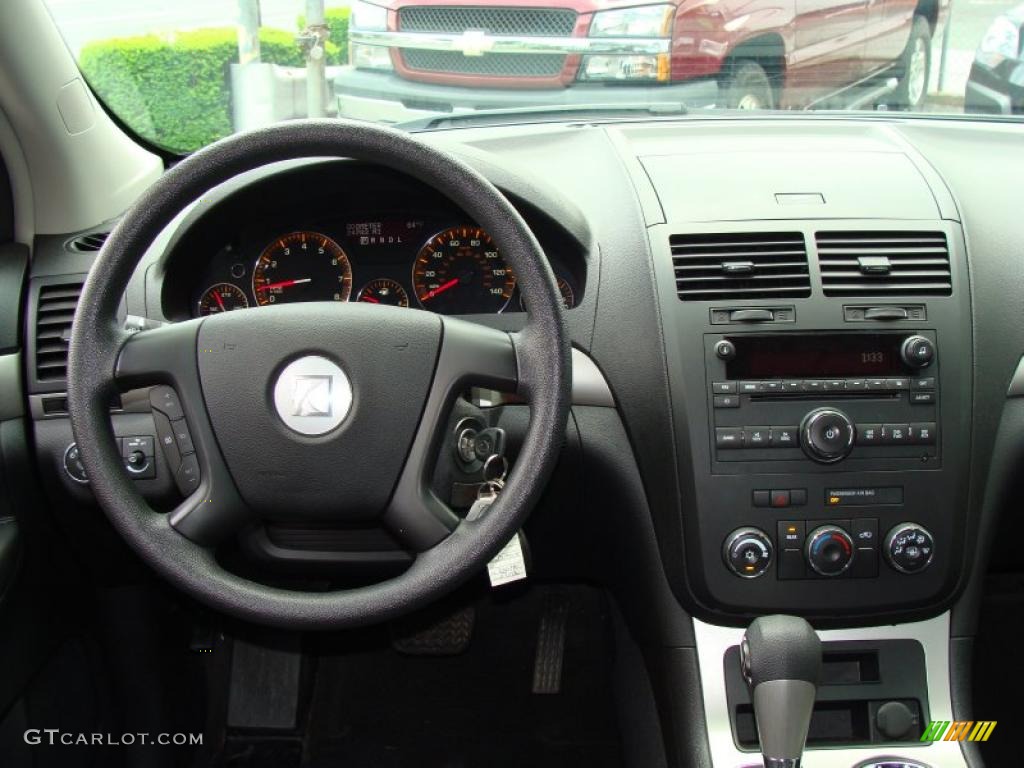 2009 Outlook XE AWD - Garnet Red / Black photo #18