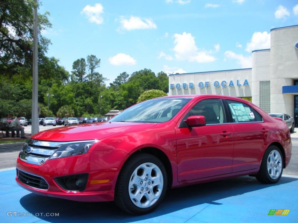 2010 Fusion SE - Red Candy Metallic / Medium Light Stone photo #1