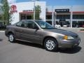 2002 Dark Bronzemist Metallic Pontiac Grand Am SE Coupe  photo #1