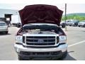 2004 Dark Toreador Red Metallic Ford F250 Super Duty Lariat Crew Cab 4x4  photo #29