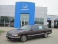 Garnet Red Metallic - DeVille Sedan Photo No. 1