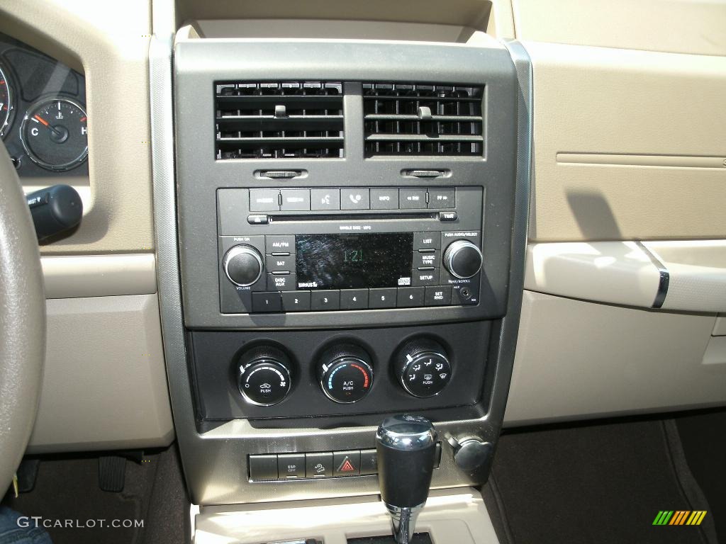 2010 Liberty Sport 4x4 - Sunburst Orange Pearl / Pastel Pebble Beige photo #9