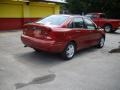 2004 Sangria Red Metallic Ford Focus SE Sedan  photo #3