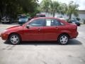 2004 Sangria Red Metallic Ford Focus SE Sedan  photo #6