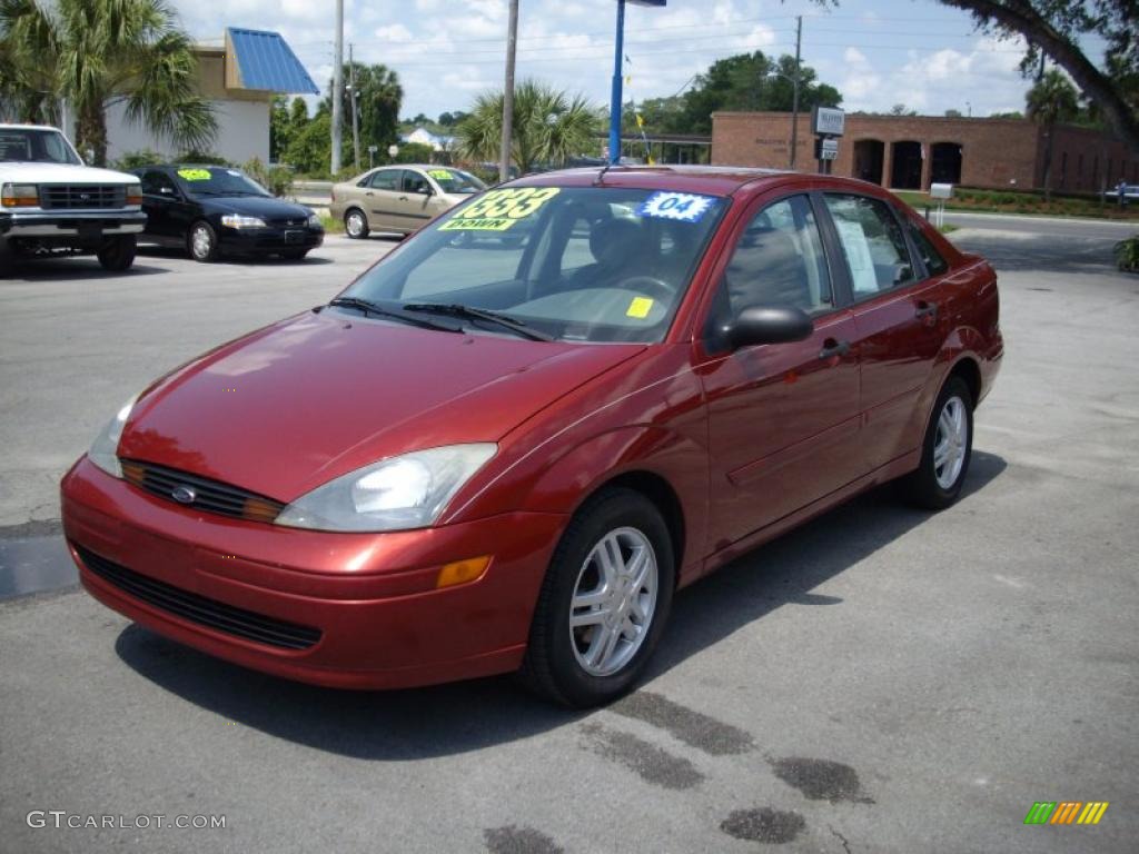 2004 Focus SE Sedan - Sangria Red Metallic / Medium Graphite photo #7