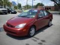 2004 Sangria Red Metallic Ford Focus SE Sedan  photo #7